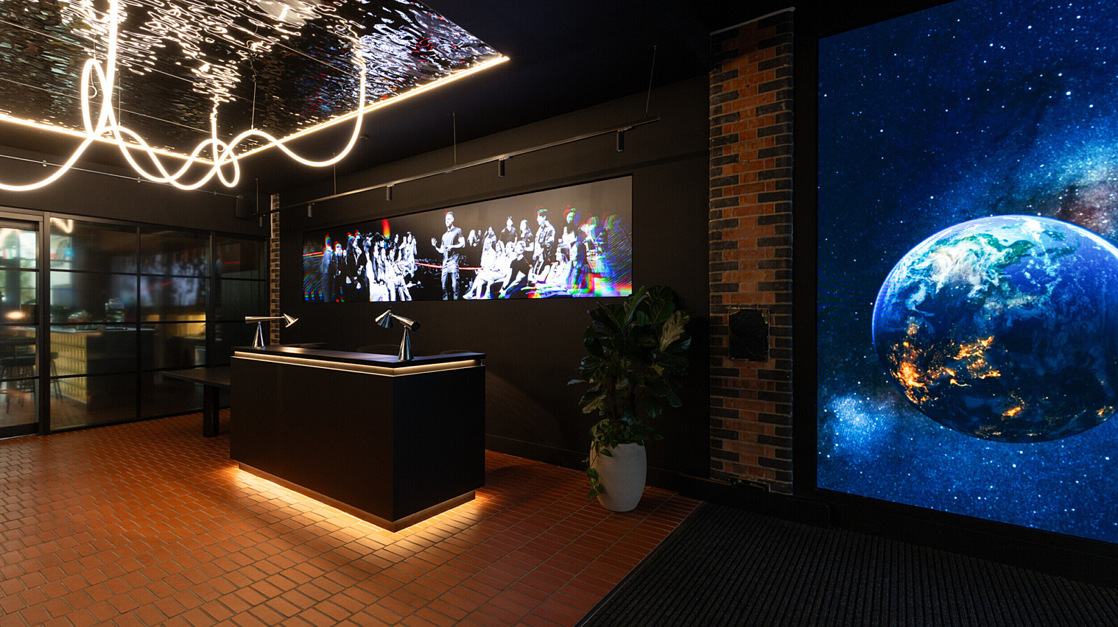 Reception desk and neon light at flight story HQ
