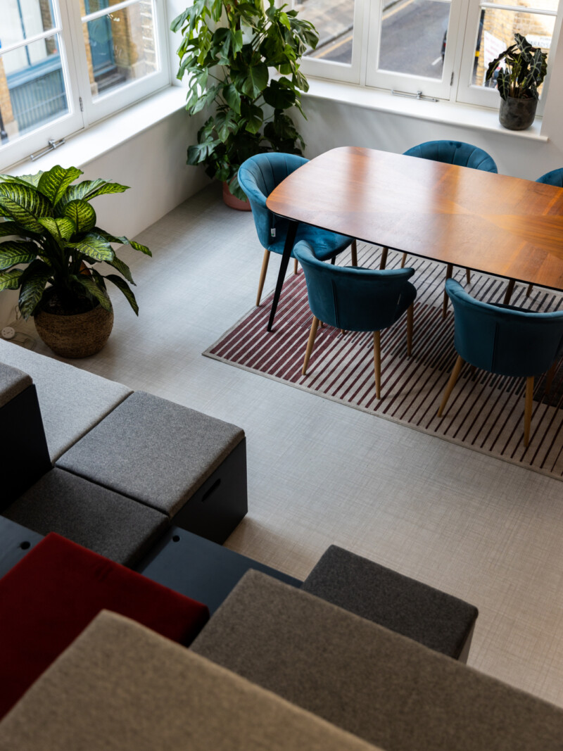 Meeting area with modular seating and vintage table in Runway East Shoreditch