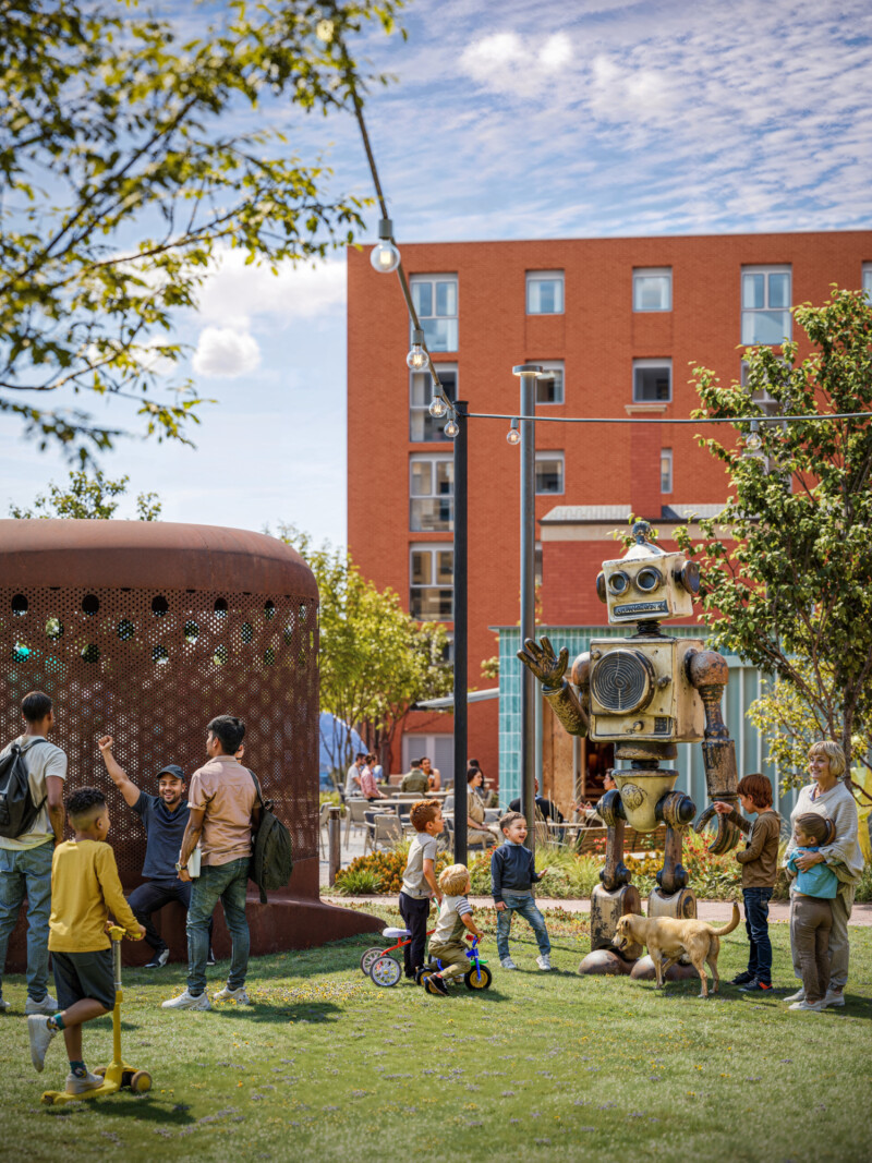 Detail view of Stopford Park artpark showing activity, art installations and hat sculpture