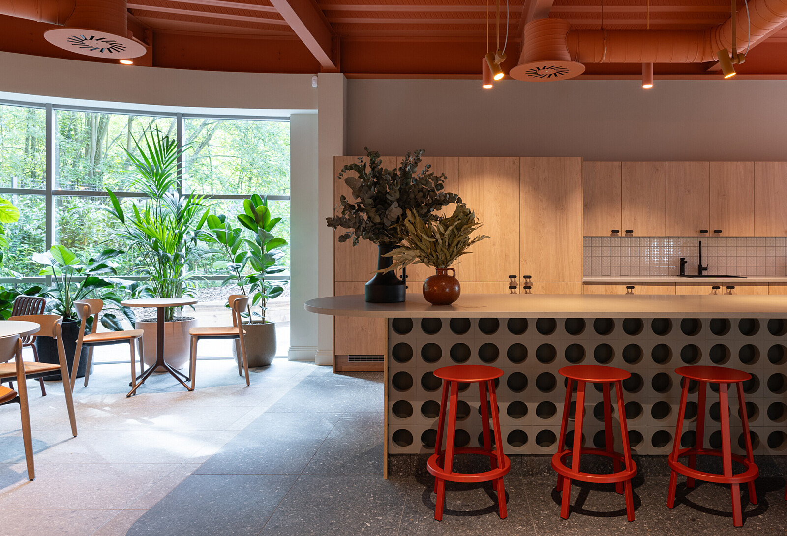 Concrete block counter in the breakout kitchen space at TMT Group HQ workspace