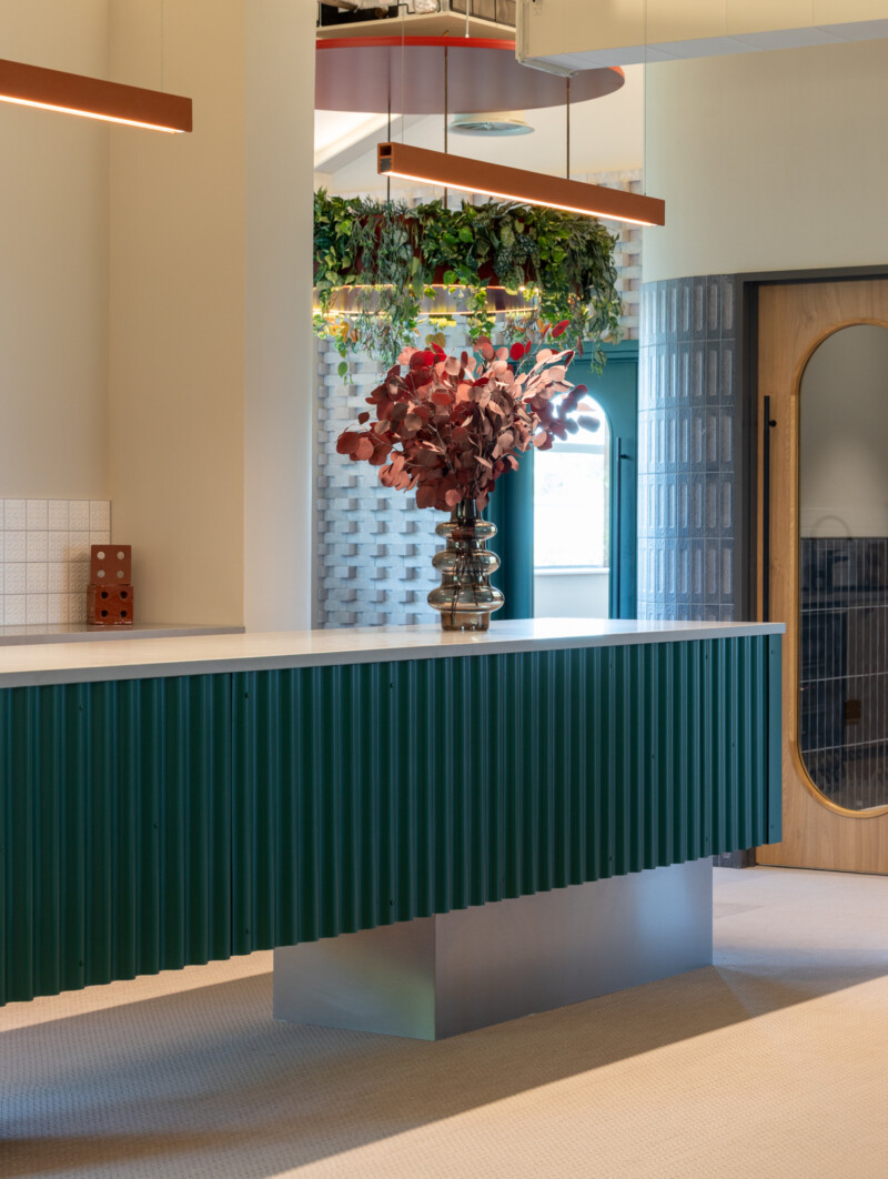 Boardroom hospitality space with green tile counter